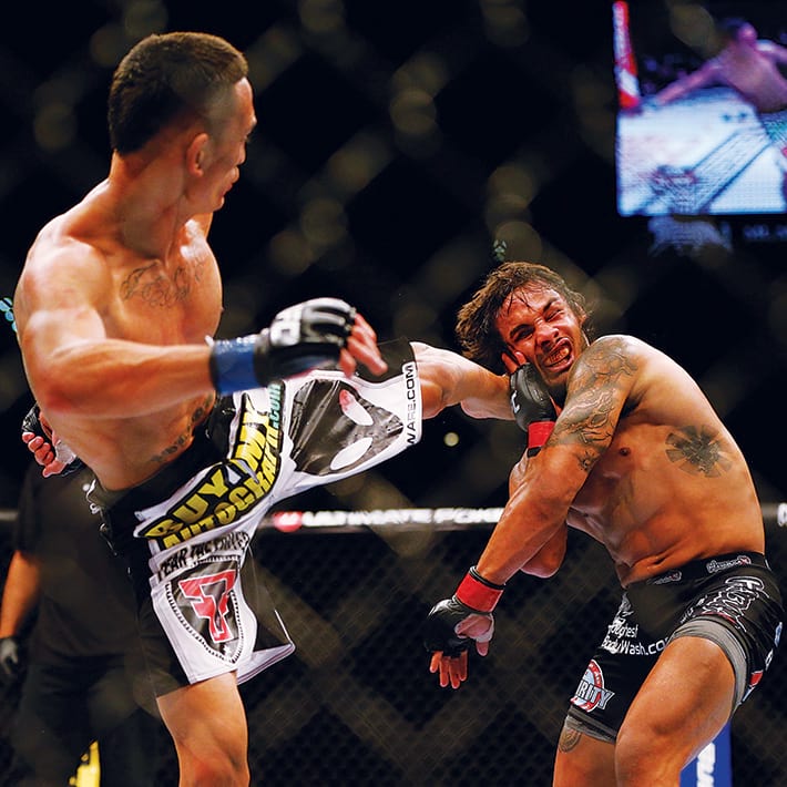 Holloway en route to a split-decision defeat by Dennis Bermudez at UFC 160