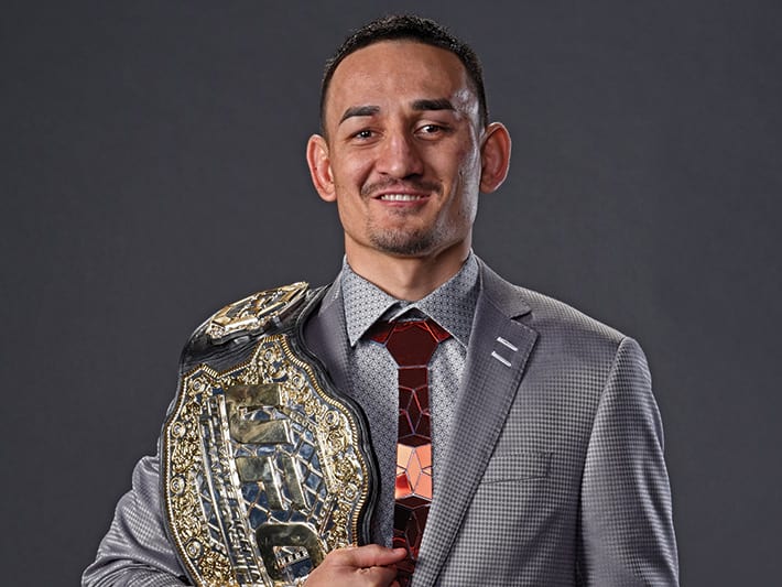 max holloway holding title belt