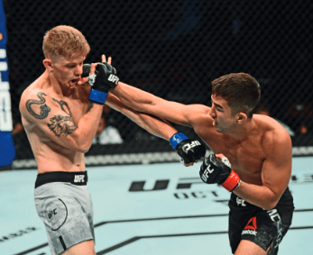 Smolka landing a right on his way to stopping Ryan MacDonald at UFC Fight Night 158, September 14, 2019