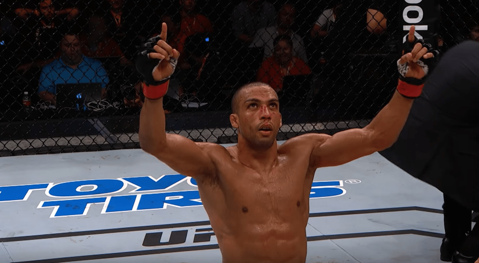 Edson Barboza celebrating victory in the UFC set to move from lightweight to featherweight division