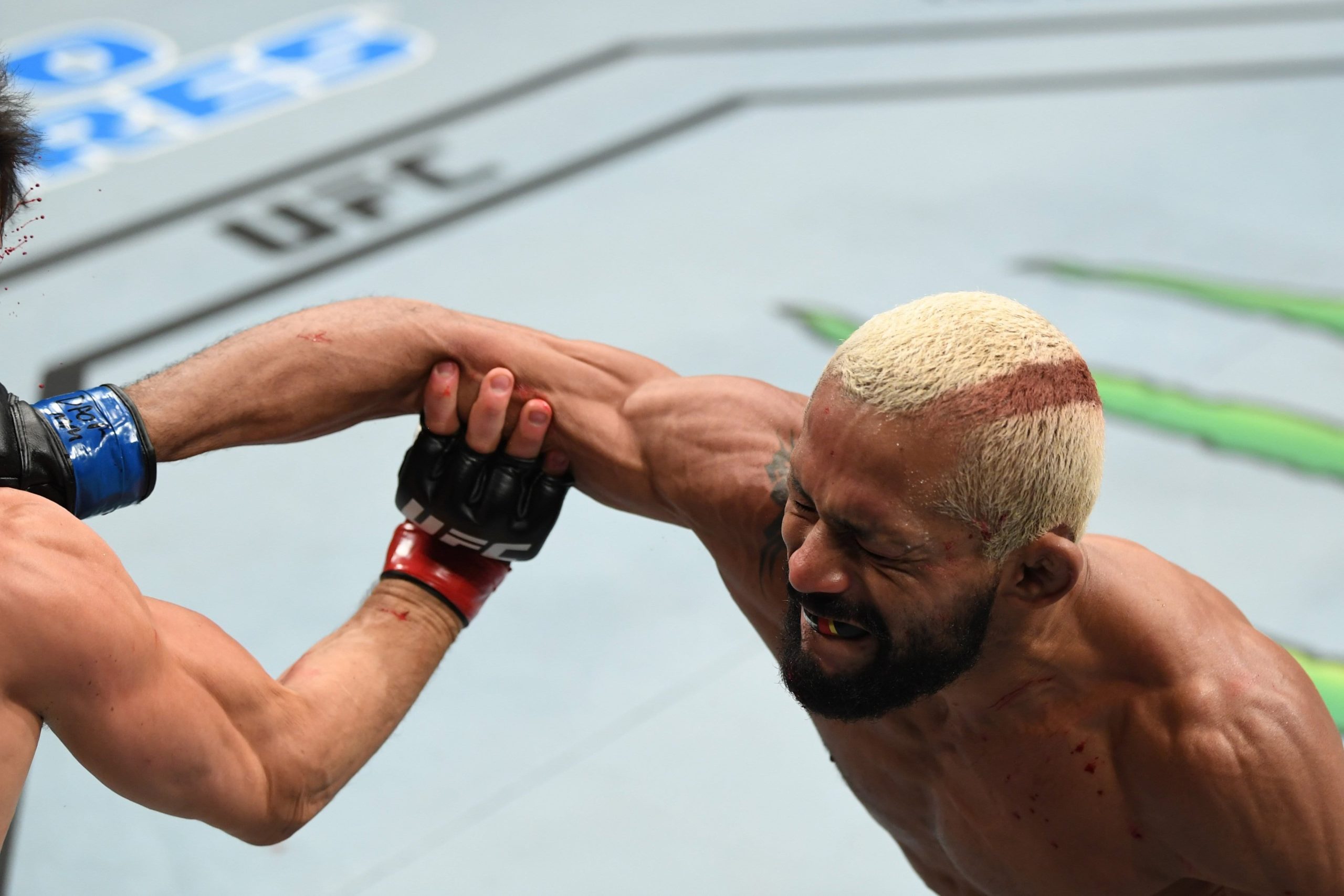 UFC Norfolk - Deiveson Figueiredo lands a punch against Joseph Benavidez